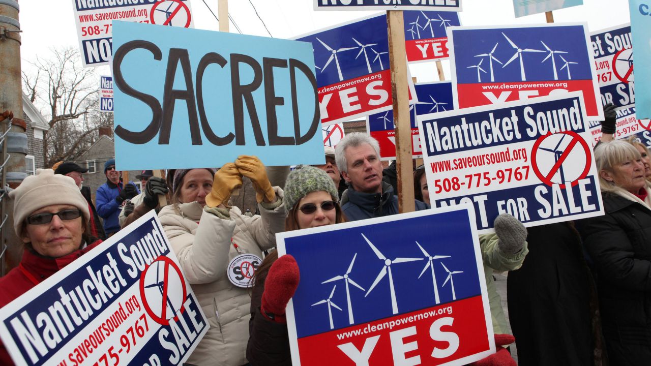 Supporters and opponents of the Cape Wind project protested outside the US Coastguard Station in Woodshole, Massachusetts in 2010. 