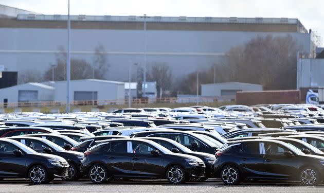 Cars are lined up after coming off the production line at the Vauxhall manufacturing plant at Ellesmere Port in north west England.